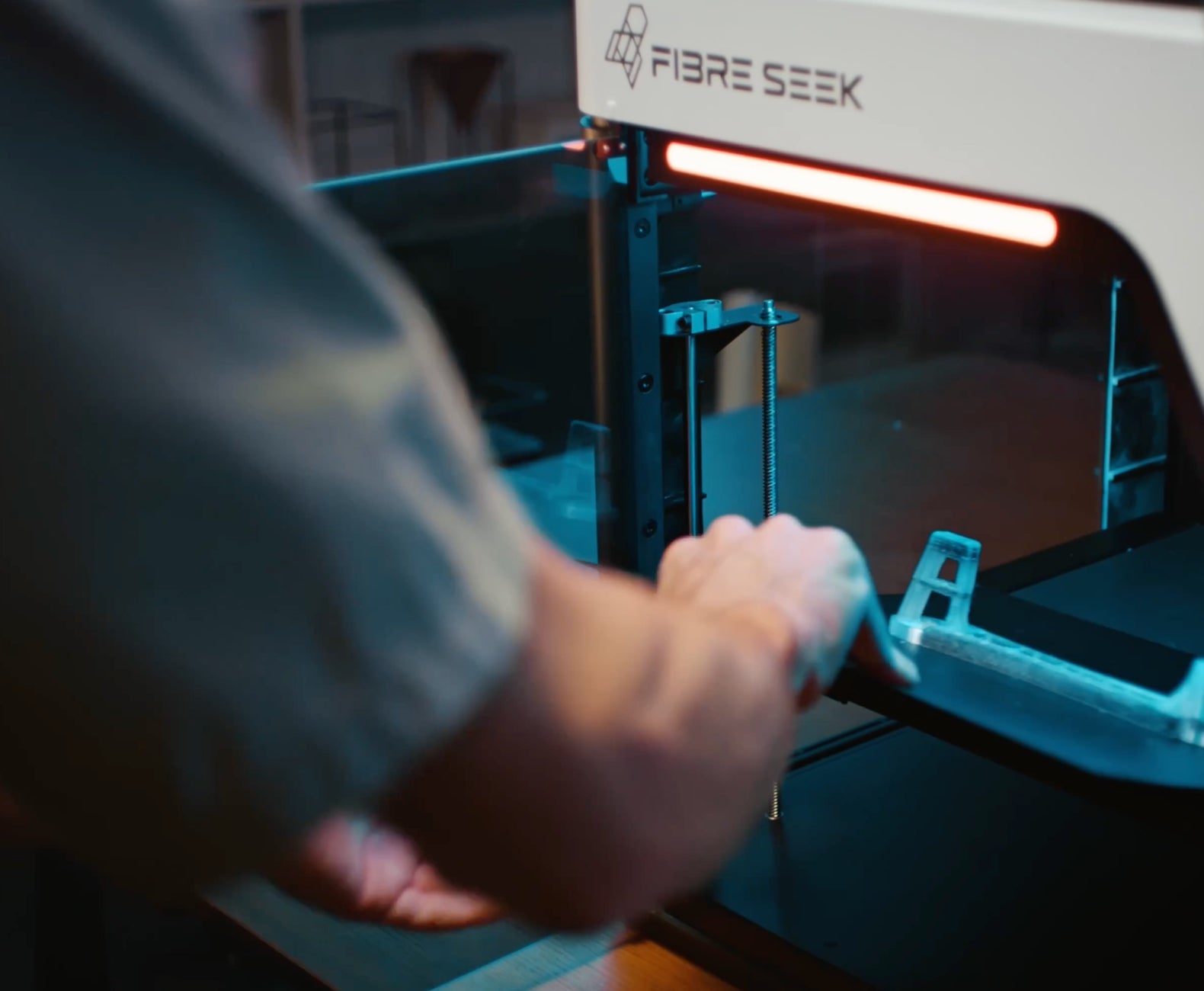 FibreSeek technician working with a FibreSeeker printer